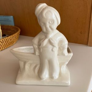 Pottery of sailor boy